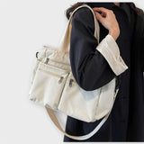 Maria. - Bolsa con varios bolsillos