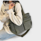 Maria. - Bolsa con varios bolsillos